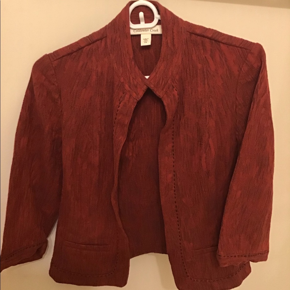 Suit jacket with tag